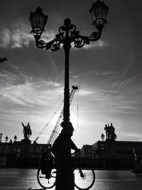 Low angle view of street light against sky