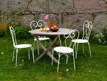 Table and chairs in yard