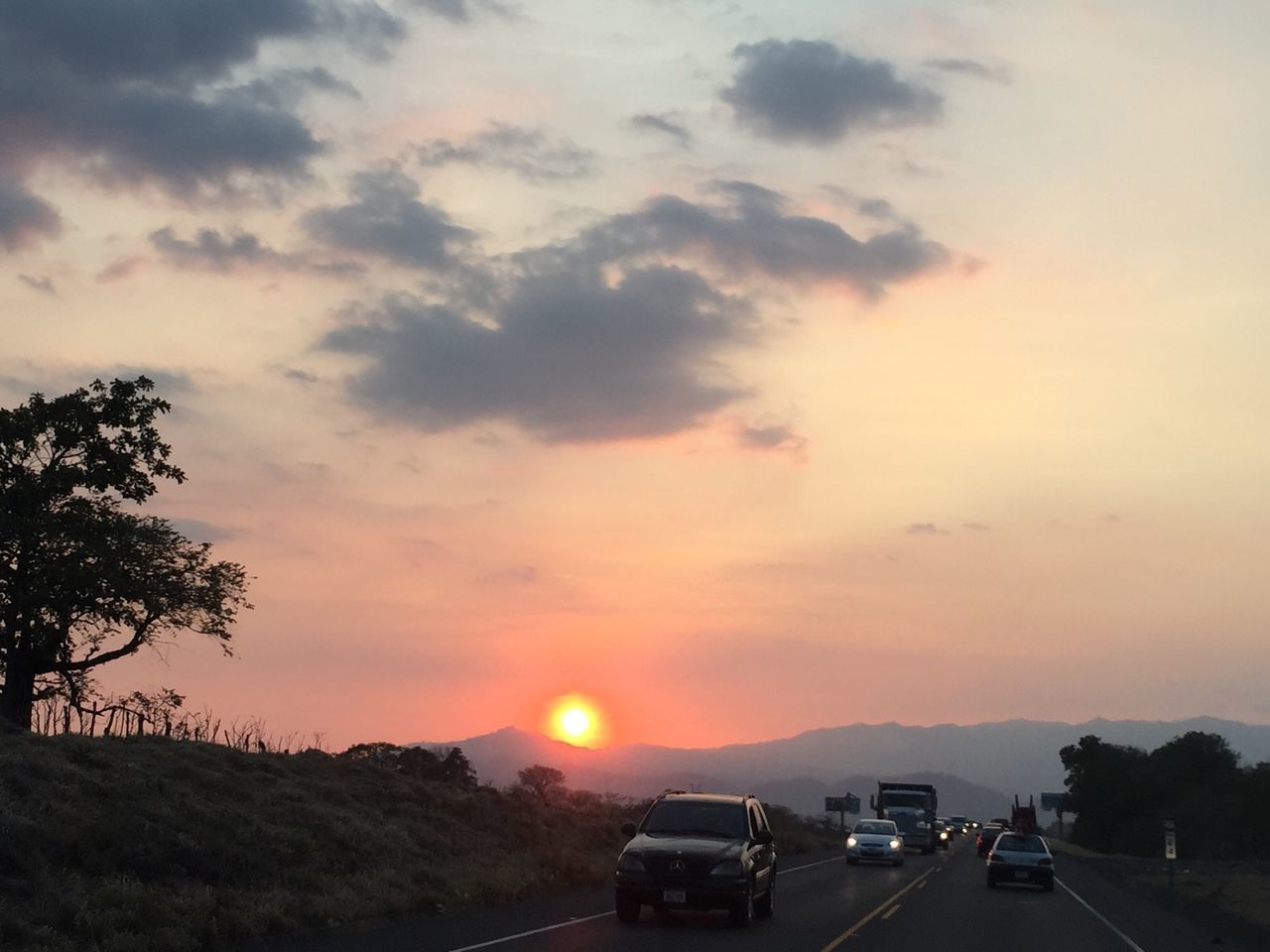 Sunset in the road