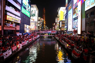 Crowd of people in city at night