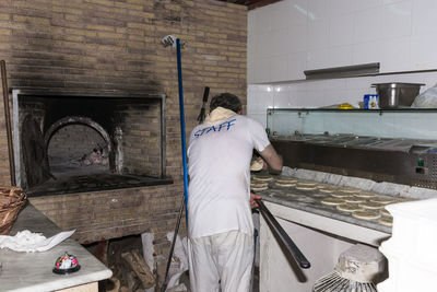 Man working in kitchen