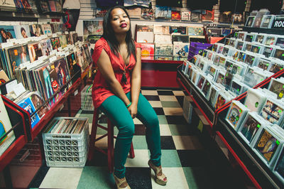 Full length of woman standing in store