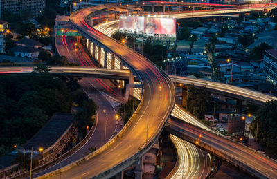 High angle view of light trails on elevated road at night