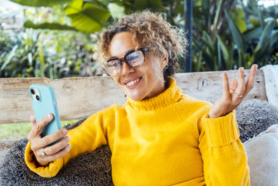 Young woman using mobile phone