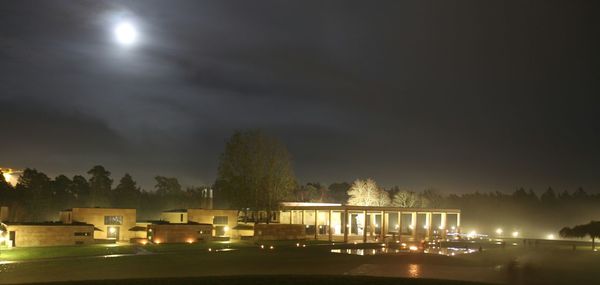 Illuminated street lights at night