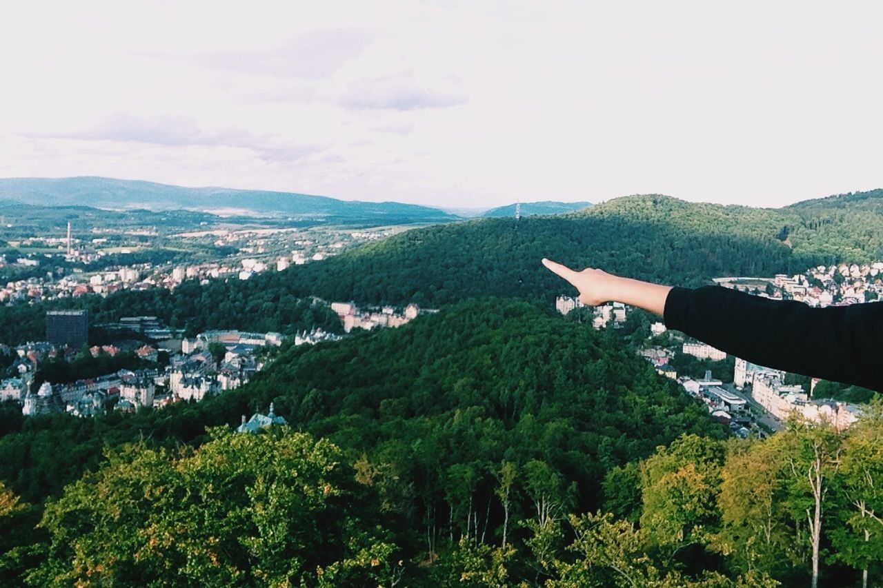 mountain, tree, lifestyles, mountain range, leisure activity, sky, scenics, beauty in nature, nature, men, person, landscape, tranquility, tranquil scene, green color, growth, hill, outdoors