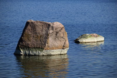 Scenic view of rock in sea
