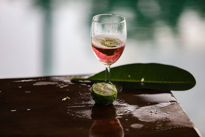 Close-up of wine glass on table