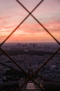 Aerial view of city buildings during sunset