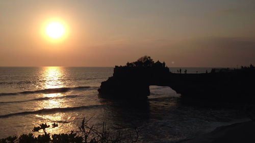 Scenic view of sea at sunset