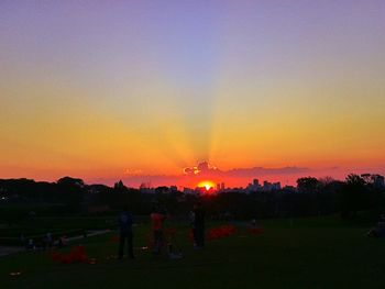 Scenic view of landscape at sunset