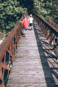 People on footbridge