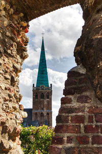 Historic building against cloudy sky