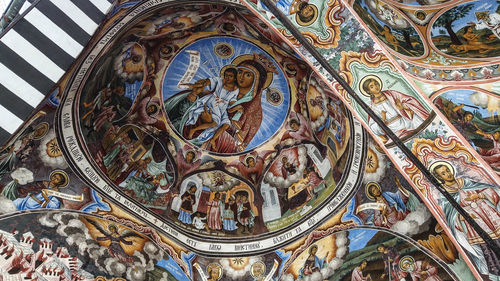 Low angle view of ornate ceiling of building