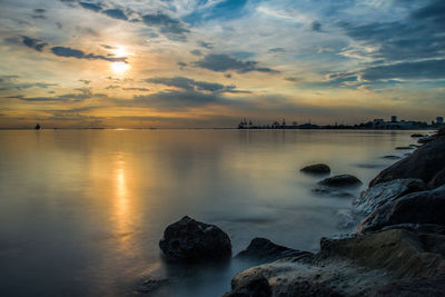 Scenic view of sea against sky during sunset