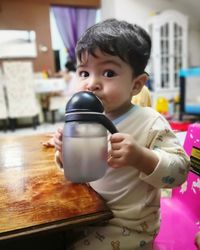 Portrait of boy holding ice cream