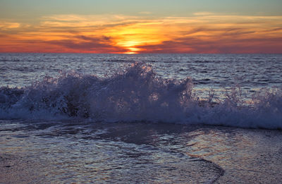 Scenic view of sea against sky during sunset