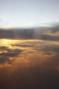 Low angle view of clouds in sky during sunset