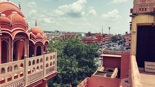 Panoramic view of buildings in city against sky