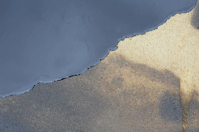 High angle view of surf on beach