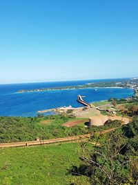 High angle view of beach against blue sky