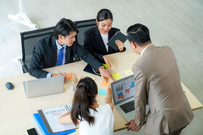 Business colleagues working at office