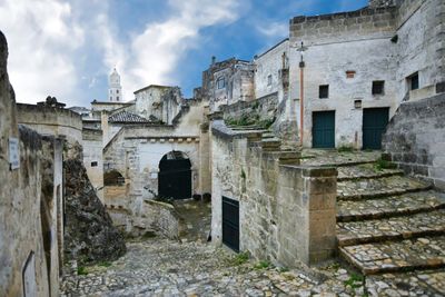 A street in the old town of matera, a city in italy declared a unesco heritage site.