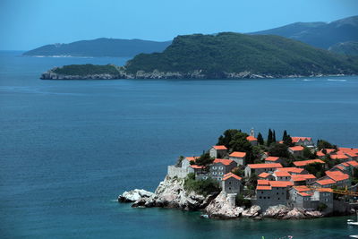 High angle view of houses on coast