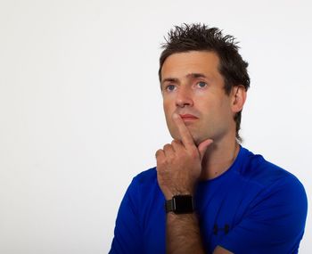 Portrait of man against white background