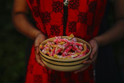 Close-up of woman with sweet food