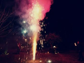 Firework display at night