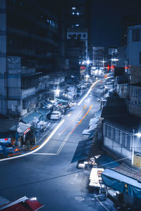 High angle view of traffic on city street at night