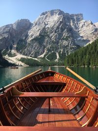 Romantic rowing boat trip on the beautiful braies lake  in the dolomites region, italy.