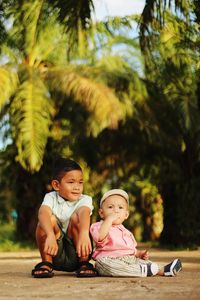 High angle view of siblings against plants