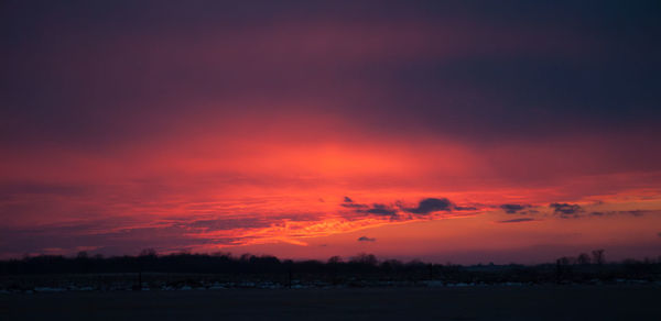 View of scenic sky over landscape at sunset