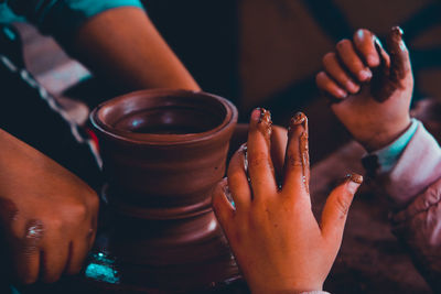 Close-up of hands holding ice cream