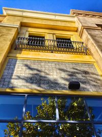 Low angle view of building against blue sky