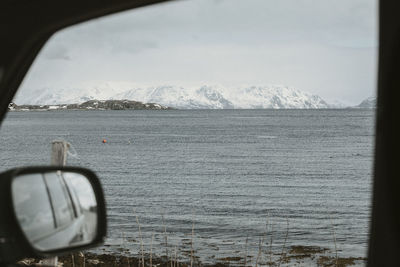 Scenic view of sea seen through window