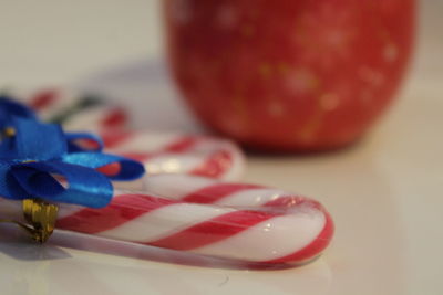 Close-up of candy canes on table