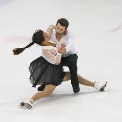 Full length of couple figure skating
