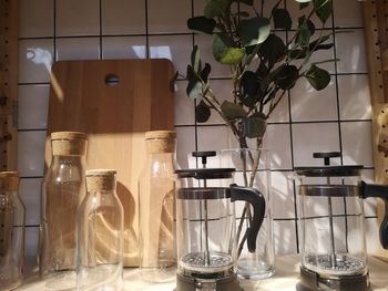 Glass of jar on table at home