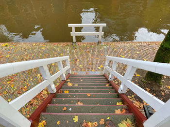High angle view of staircase by lake