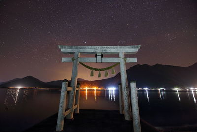 Night sea and torii