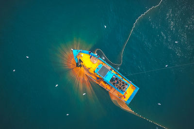 High angle view of ship sailing in sea