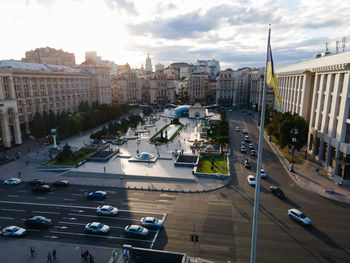 High angle view of city street and buildings against sky