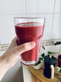 Midsection of woman holding drink