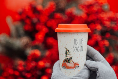 Close-up of hand holding drink