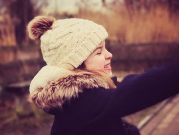 Close-up of person wearing hat