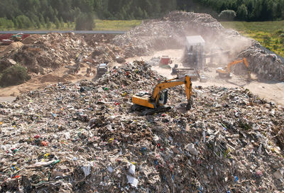 Garbage on field by water