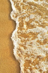 Directly above shot of sand on beach